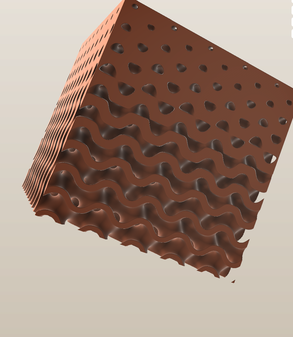 A graded gyroid slab — cell size driven by a scalar field